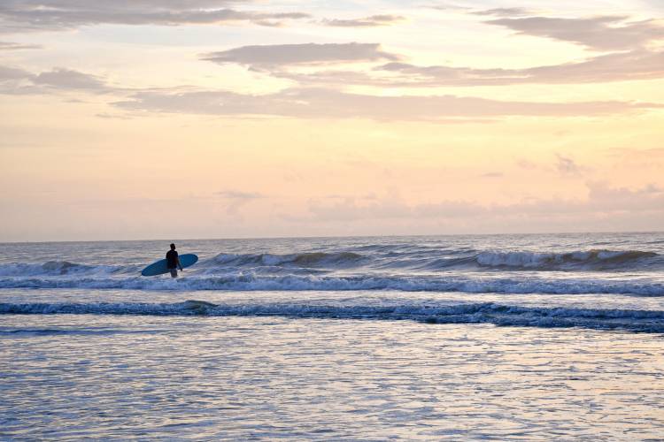 Uncover the Secrets of Cocoa Beach The Story Behind the Iconic Surfer